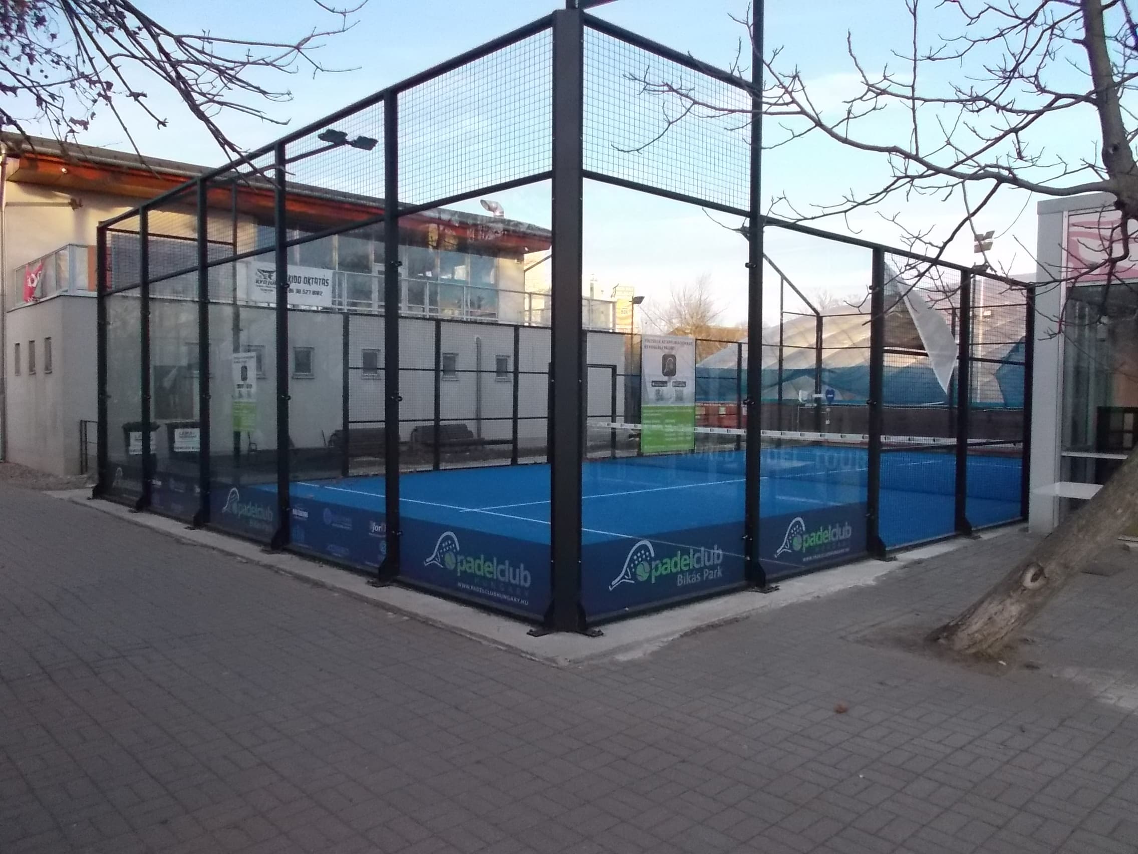 An enclosed outdoor padel court